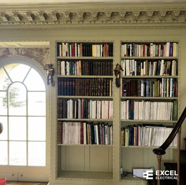 Period home library lighting by Excel Electrical